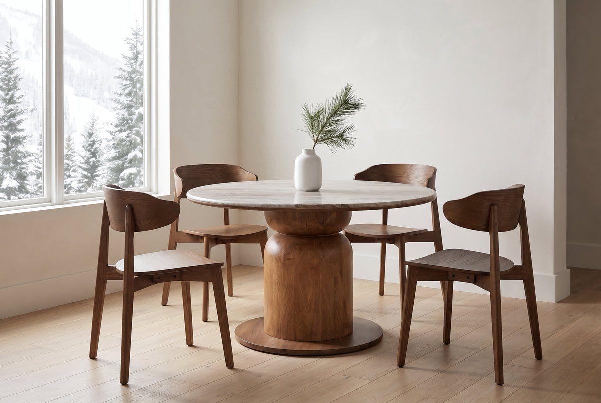 Frascati dining set with four walnut wood chairs in a Whistler mountain home, snowy firs beyond the window