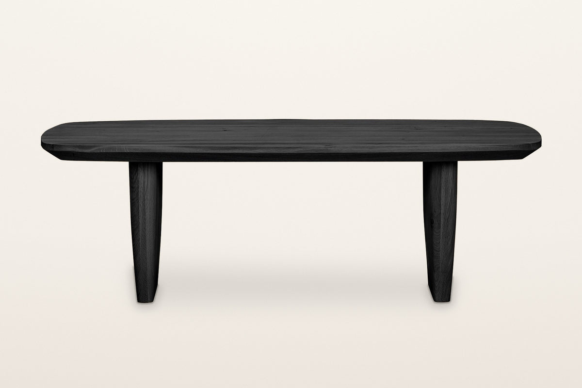 Frontino coffee table in Black, straight front view on a warm white studio backdrop