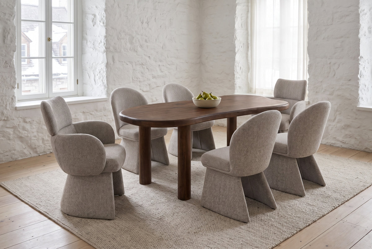 Gaiole dining set in an old Quebec City stone house, whitewashed stone walls and snowy rooftops through the window
