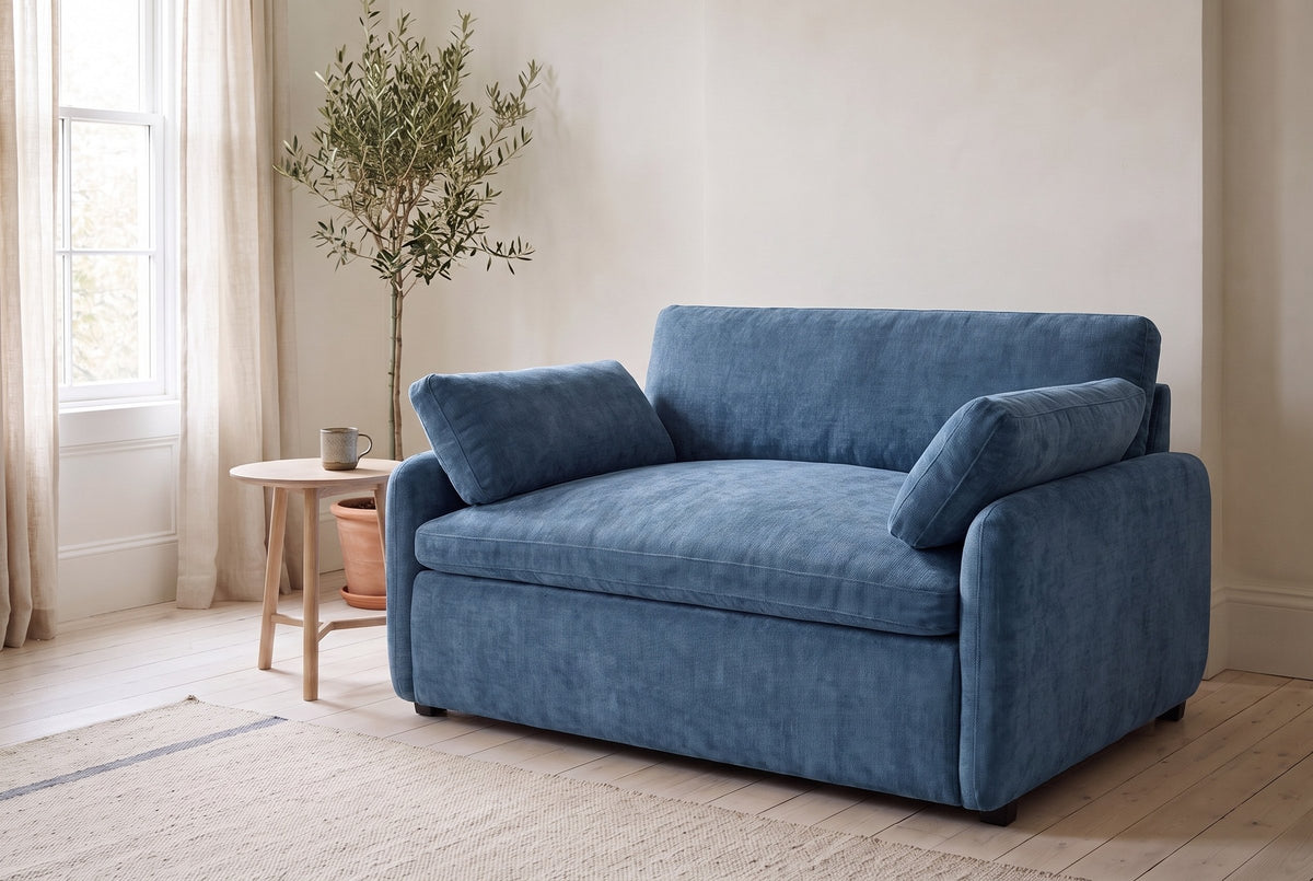 Gallipoli chair in denim blue in a bright Halifax living room in the morning