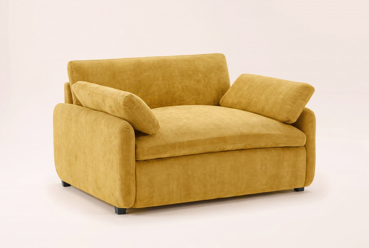Gallipoli oversized chenille accent chair in mustard yellow, three-quarter view on a warm off-white backdrop