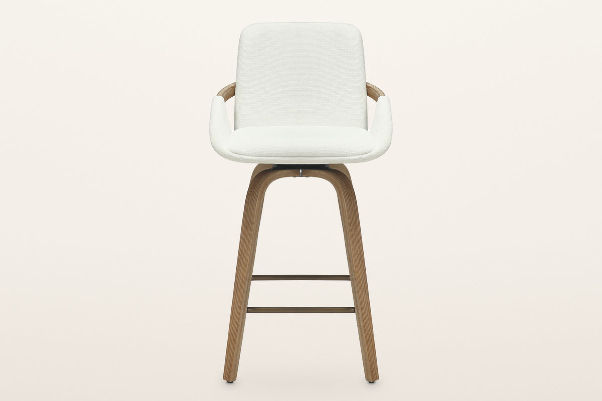 Gardone counter stool in ivory, straight front view: the tall back, the winged seat, the bentwood band and the four legs
