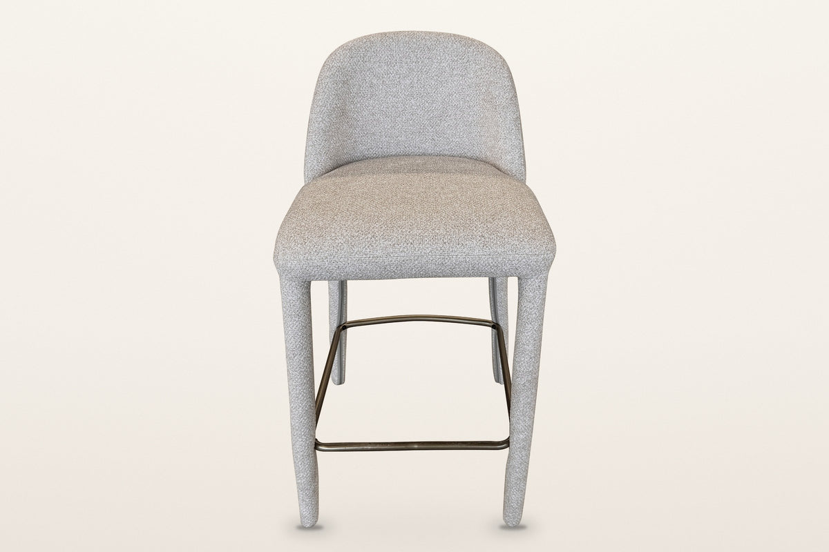 Gavi counter stool in beige, straight front view: the low rounded back, the thick seat