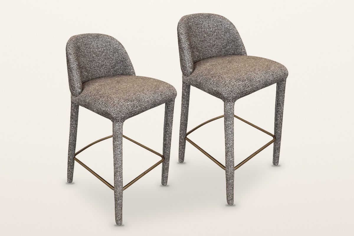 Two Gavi counter stools in brown side by side on a warm white studio backdrop: sold as a set of two