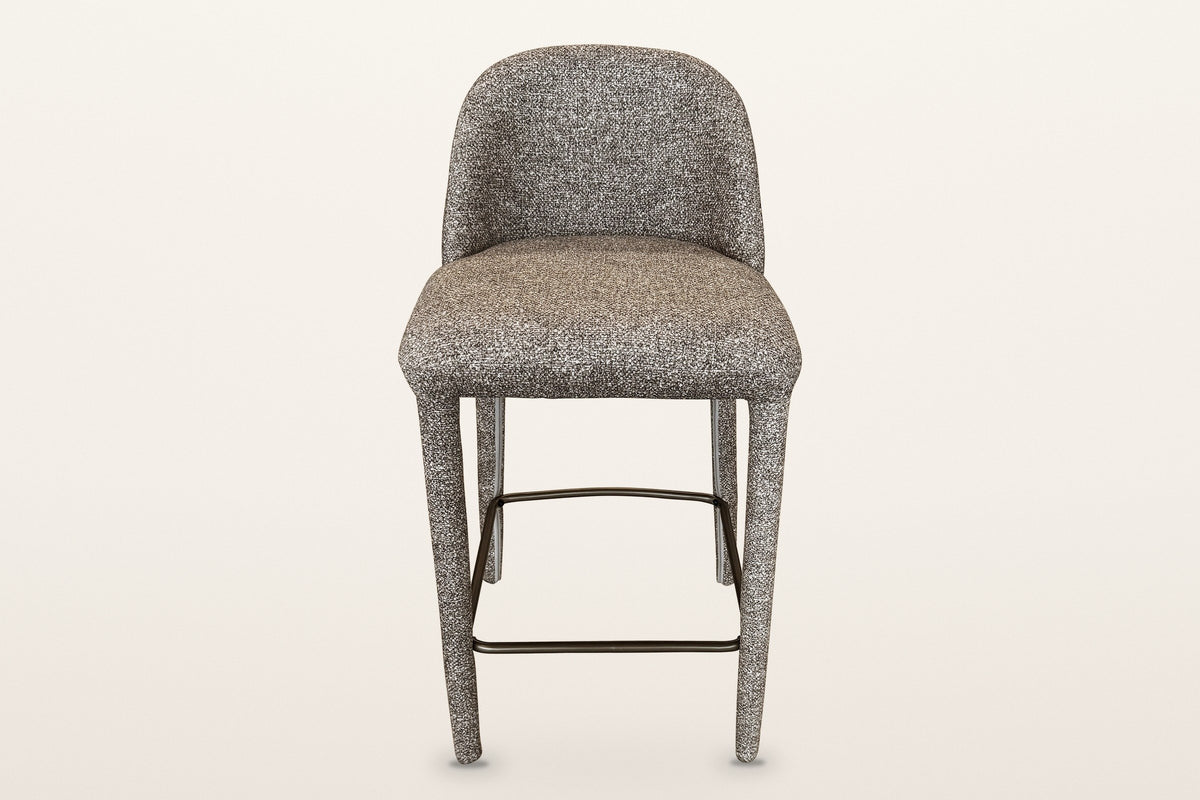 Gavi counter stool in brown, straight front view: the low rounded back, the thick seat