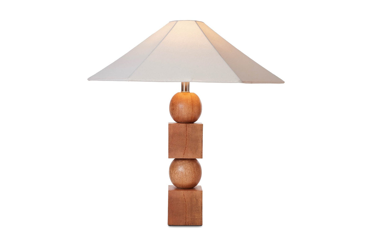 Geneva table lamp switched on, with light glowing through the cotton shade