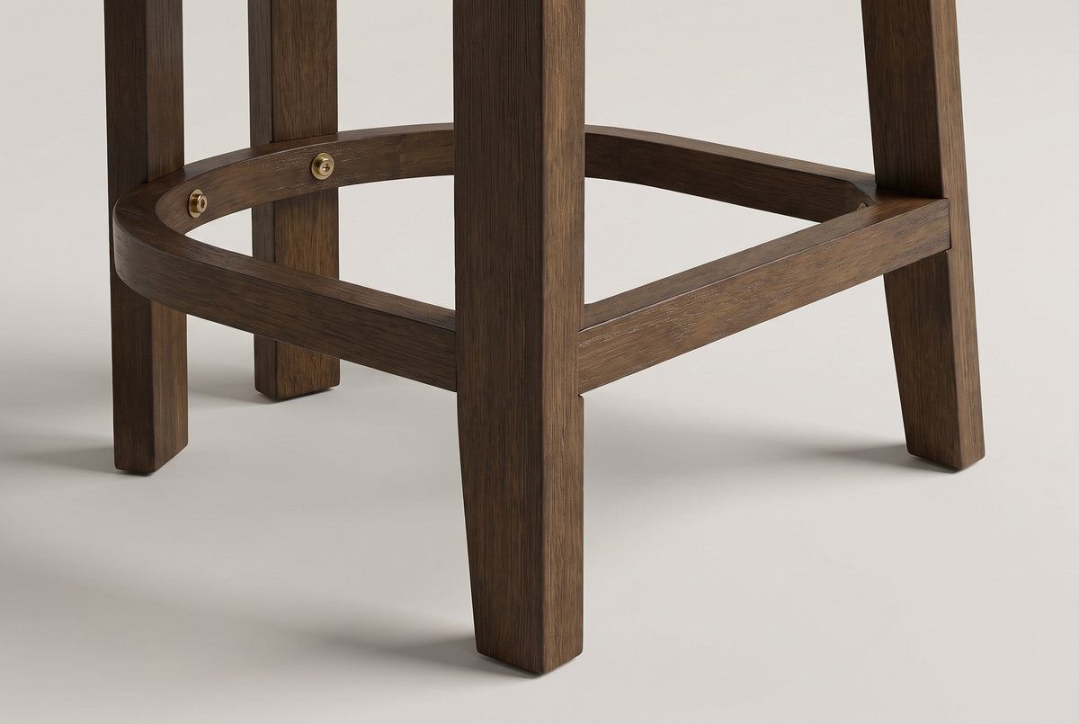 Close-up of the Gradisca front leg, rear legs and D-shaped footring with two small bolts in Walnut