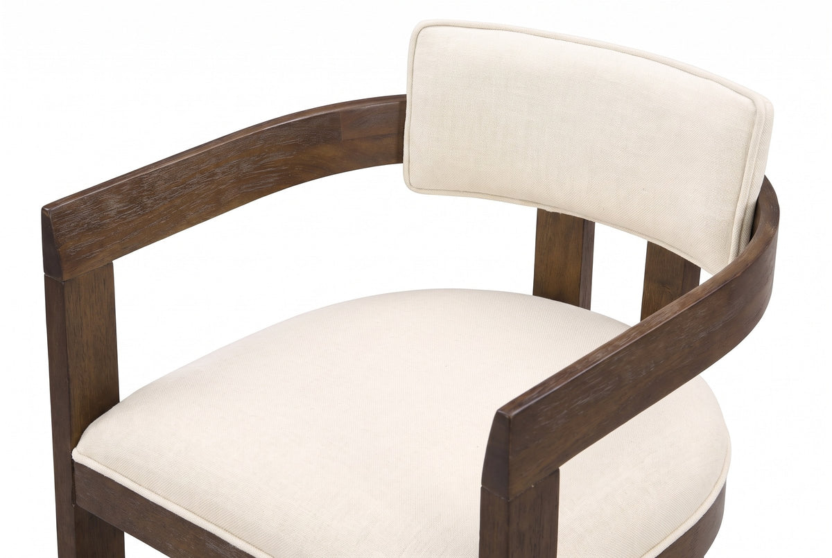 Close-up of the Gradisca floating back pad, the curved wooden rail and the piped seat in Walnut