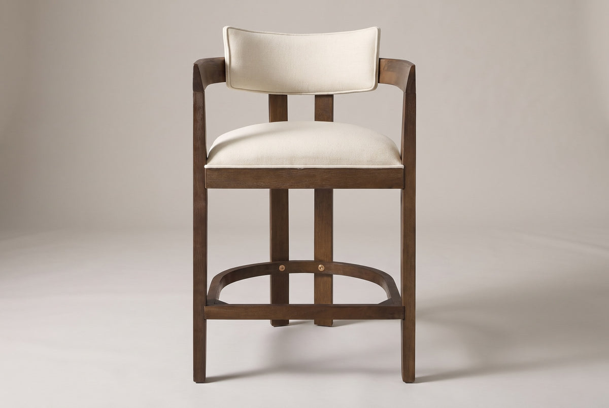 Gradisca horseshoe counter stool in Walnut, straight front view on a studio backdrop