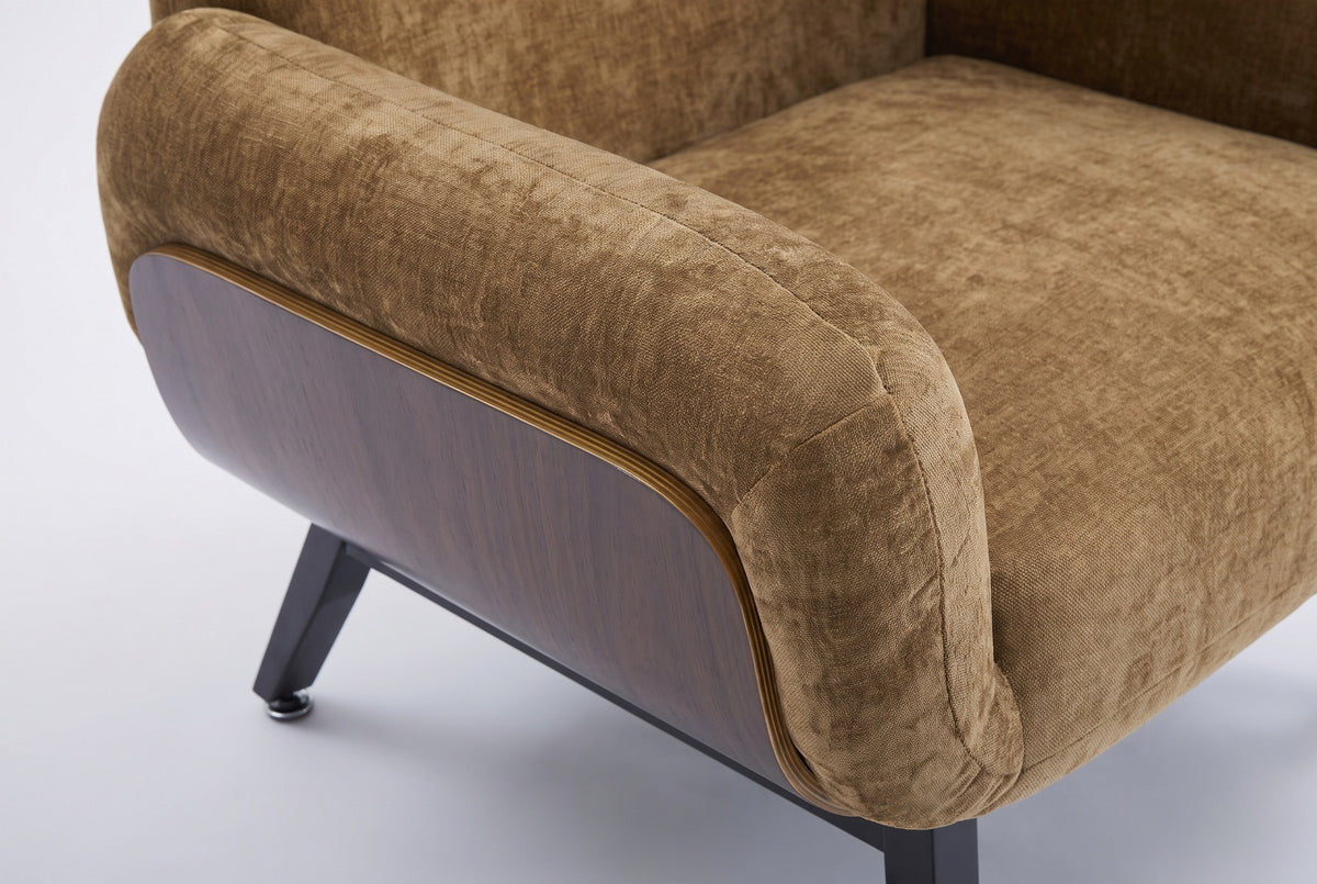 Close-up of the plump tan arm over the curved walnut-tone wood panel and its layered edge
