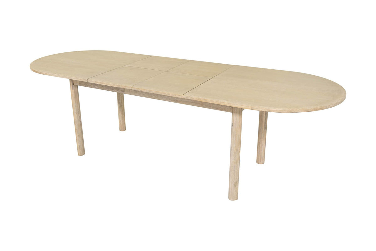 Ilaria dining table fully extended to 102 in, three-quarter view