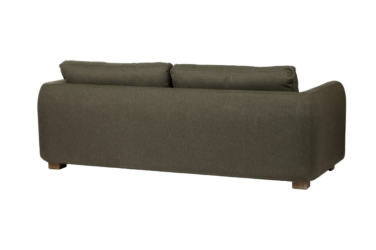Isolde moss green sofa, rear three-quarter view