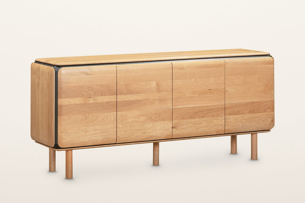 Larino oak sideboard in Natural and Black, three-quarter view on a warm white studio backdrop: four rounded oak doors with ho