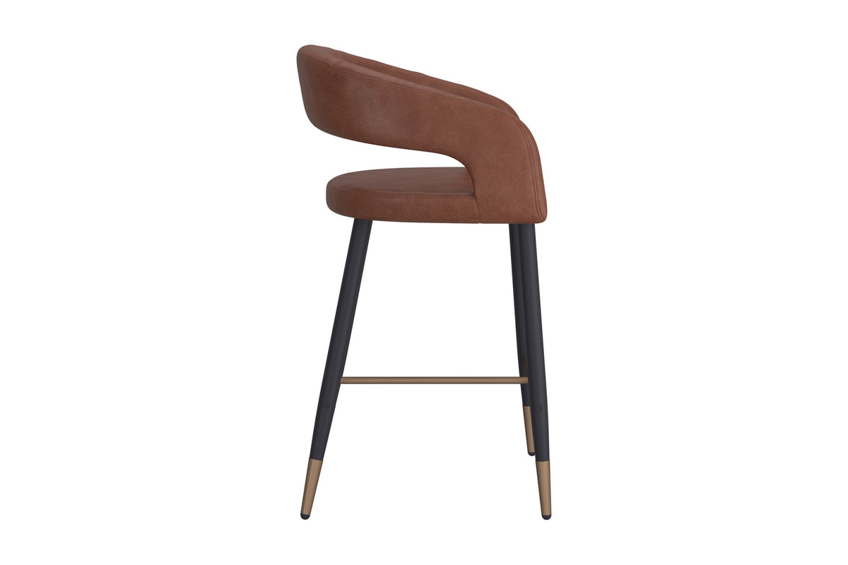 Lark counter stool, side view showing the open back and aged gold footrest