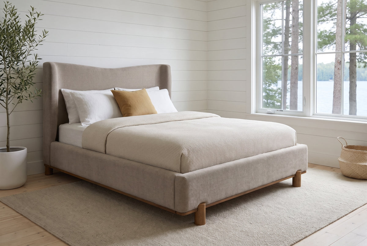 Lerma platform bed in dark beige chenille with an oatmeal waffle duvet in a Muskoka cottage bedroom