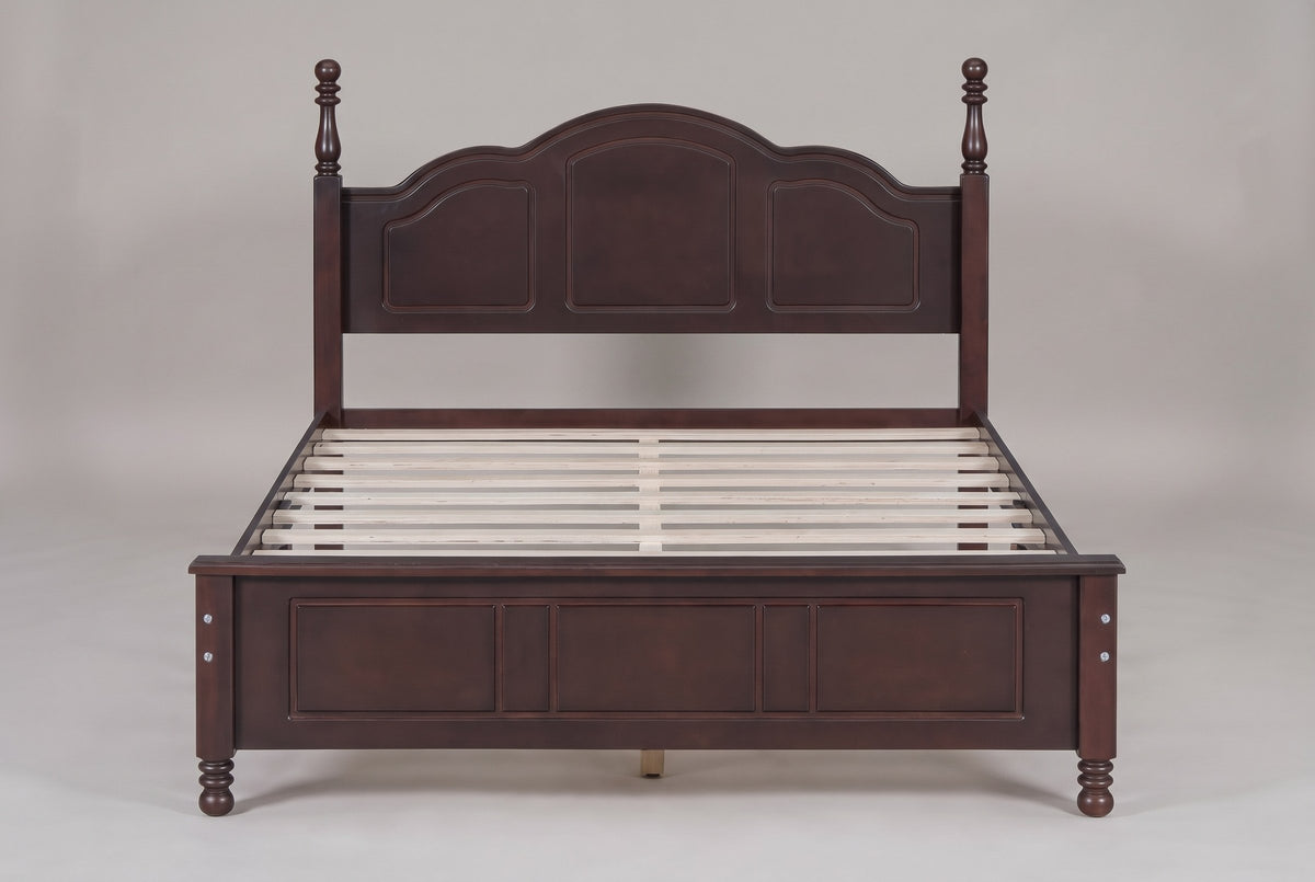 Loreto bed in walnut, straight front view: arched three-panel headboard, turned finials and five-field footboard