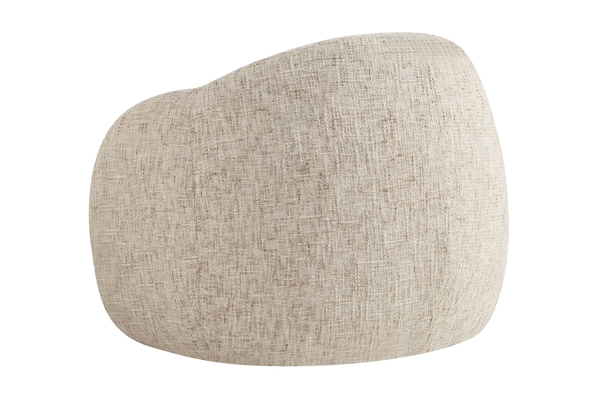 Lowell beige accent chair from behind at an angle, showing its cloud-like shape