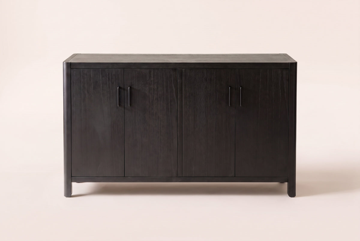 The Maren storage cabinet in Black seen straight on, with its two pairs of doors and four black bar handles