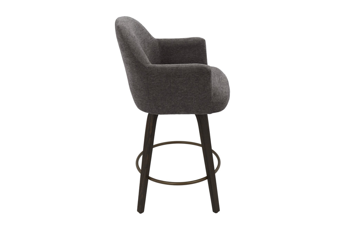 Miles counter stool, side view showing the arm and aged gold footrest