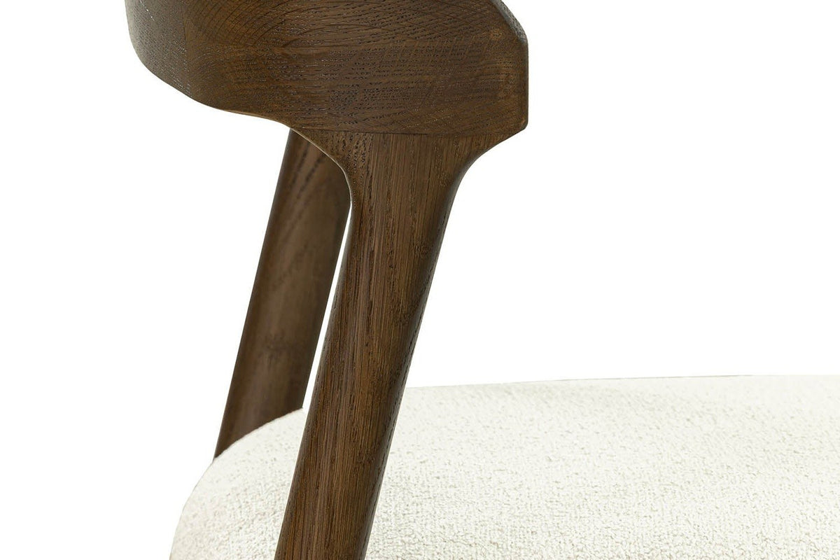 Close-up of the Mondavio back post and the Ivory upholstered seat in its textured fabric