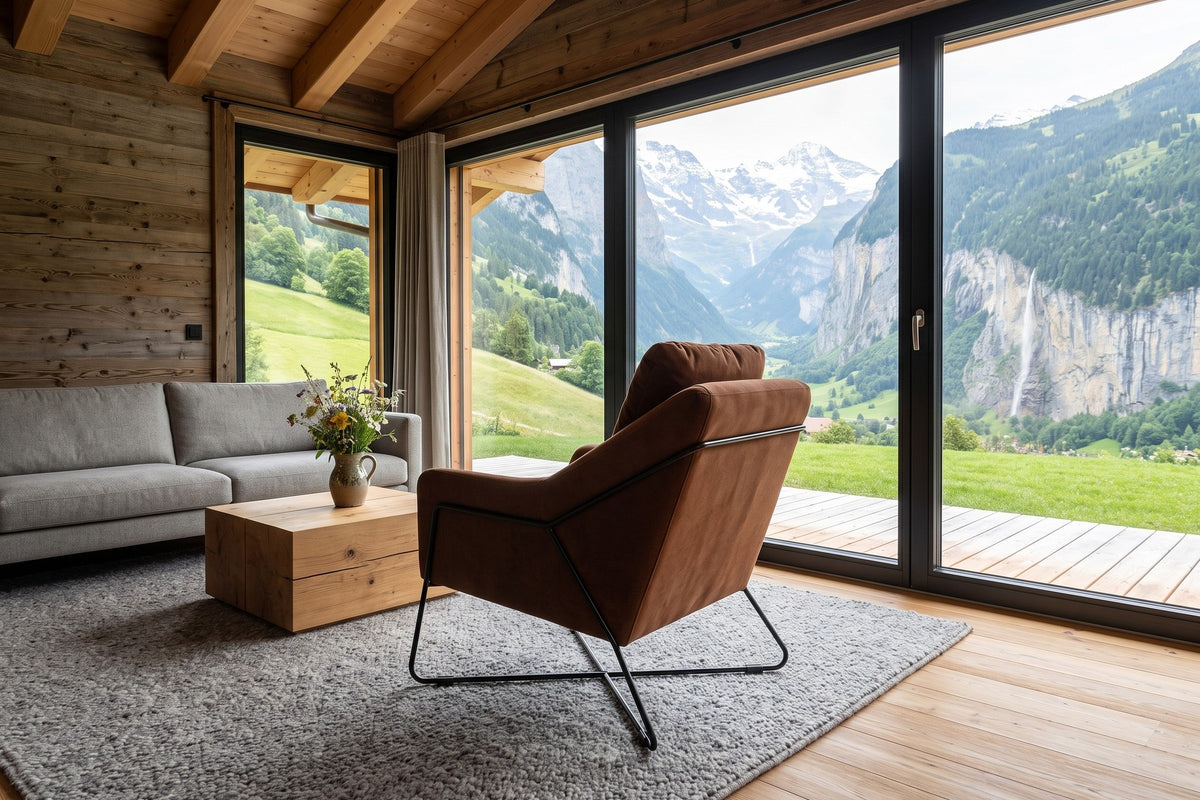 Montelupone accent chair in Rust seen from behind in a Wengen chalet in the Bernese Oberland