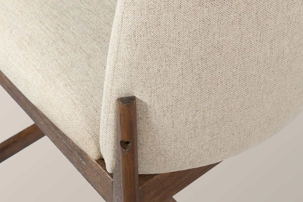 Close-up of the Monteriggioni beige fabric back pad and seat