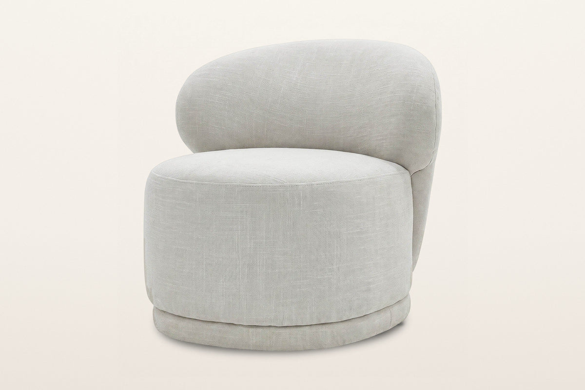 Monterubbiano accent chair in Ivory twill, three-quarter view on a warm white studio backdrop