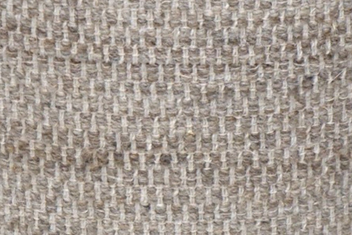 Close-up of the Morgex basket-weave wool: small raised blocks of ivory and greige-taupe yarn