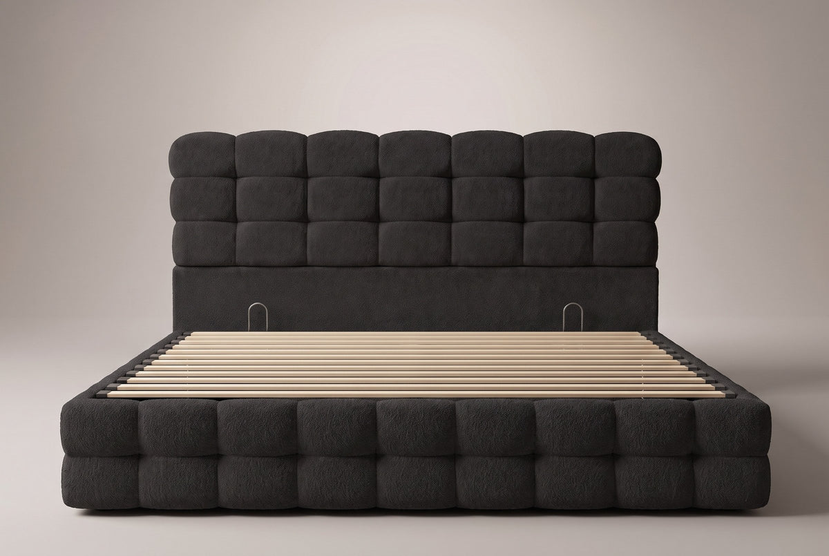 Nemi bed in black bouclé, straight front view: a headboard of three rows of seven blocks over a plain band