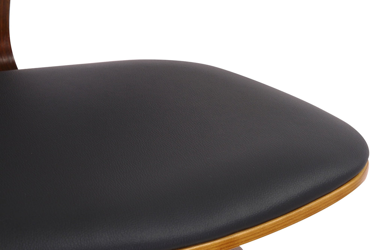Close-up of the matte black faux leather seat on the Oakes counter stool
