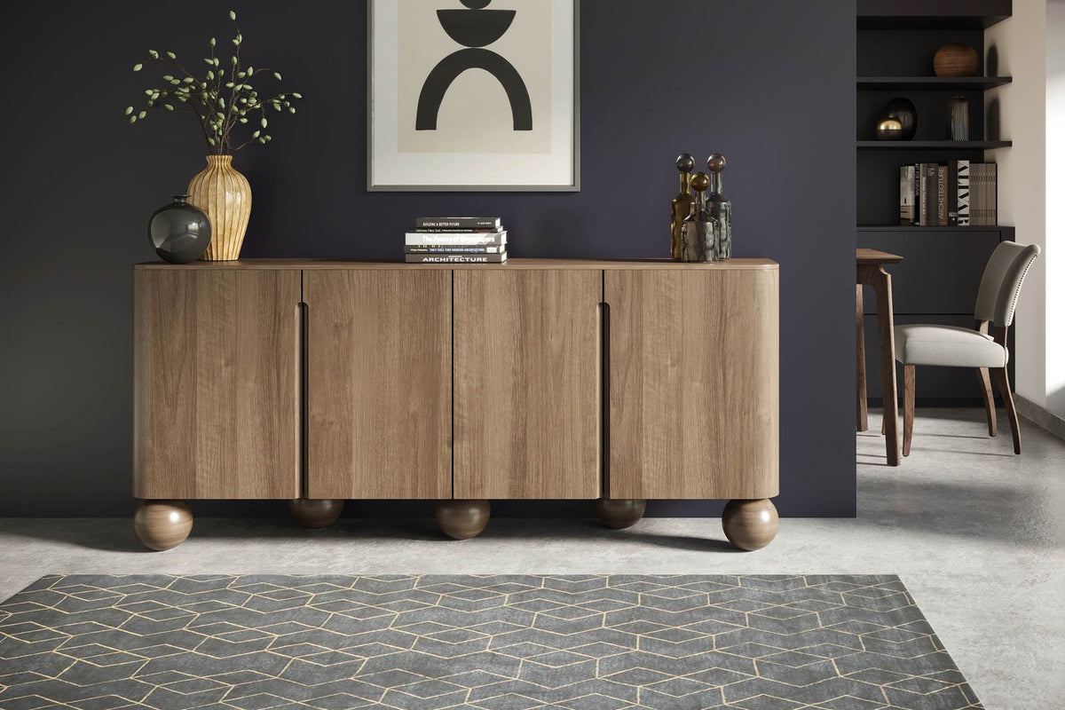 Orson mango wood sideboard, front view in a dining room with a patterned rug