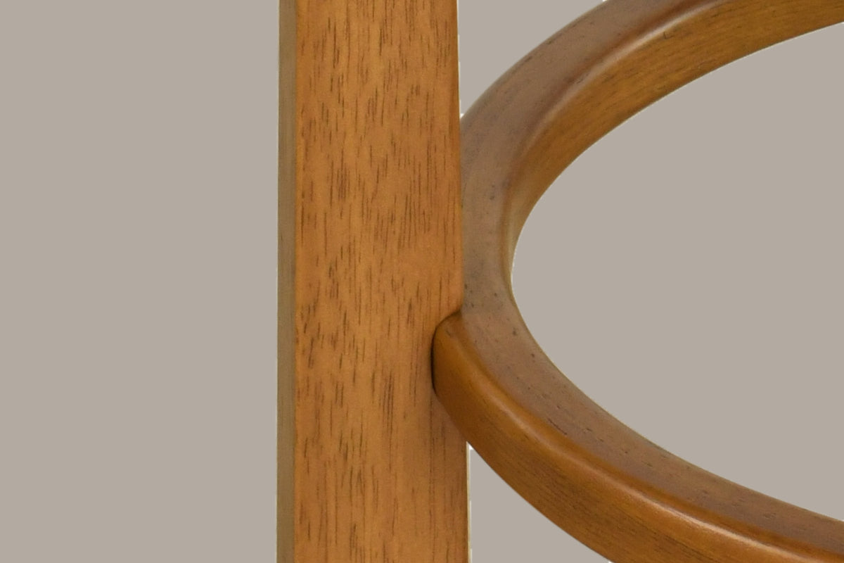 Close-up of an Otricoli square rubberwood leg and the round wooden footring joined to it