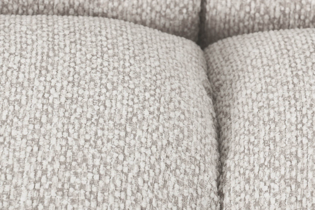 Close-up of the Pergola puffs in Beige: a flecked woven polyester and the deep seams between the rounded channels