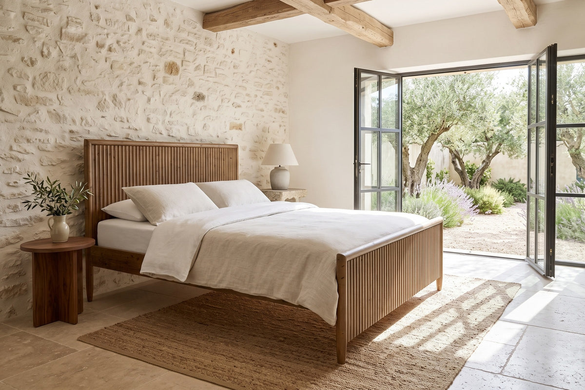 Pettorano bed in a bedroom in an Oppede village house in the Luberon, raised three-quarter view from the other foot corner