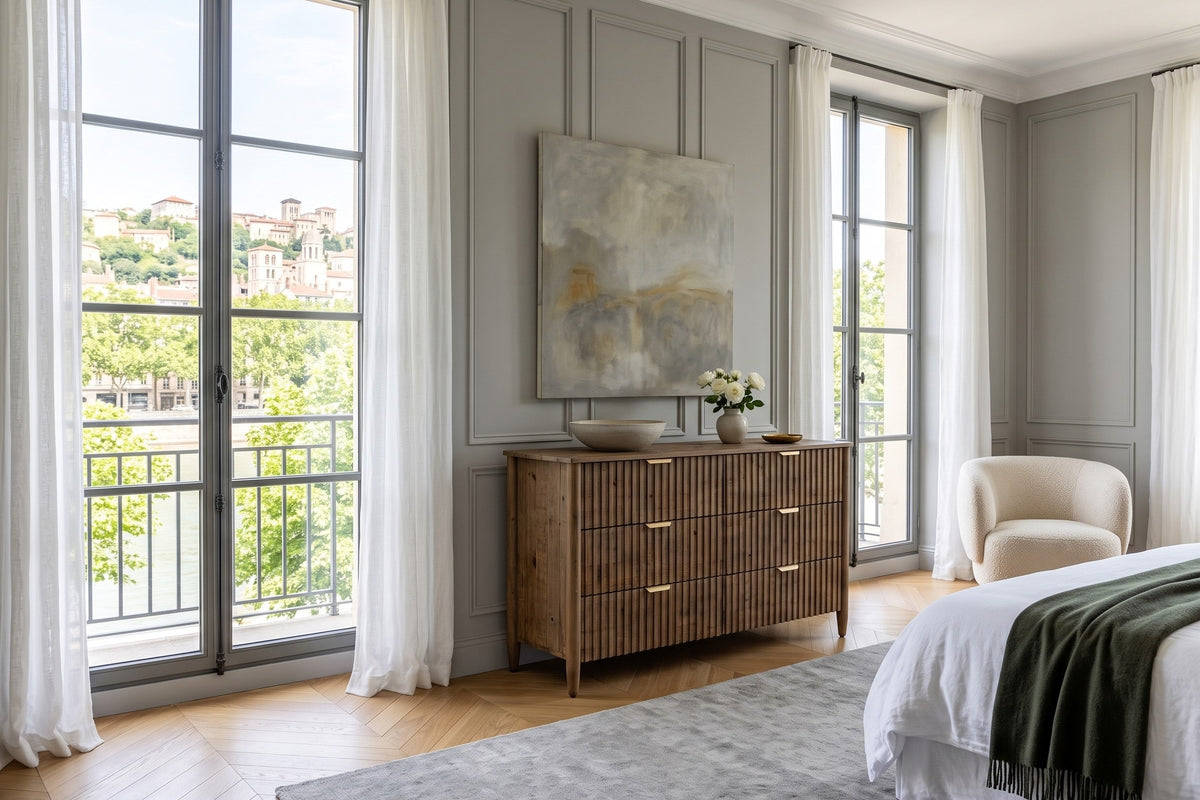 Pettorano dresser in Brown reclaimed pine in a Lyon apartment bedroom, with grey panelled walls, an abstract painting