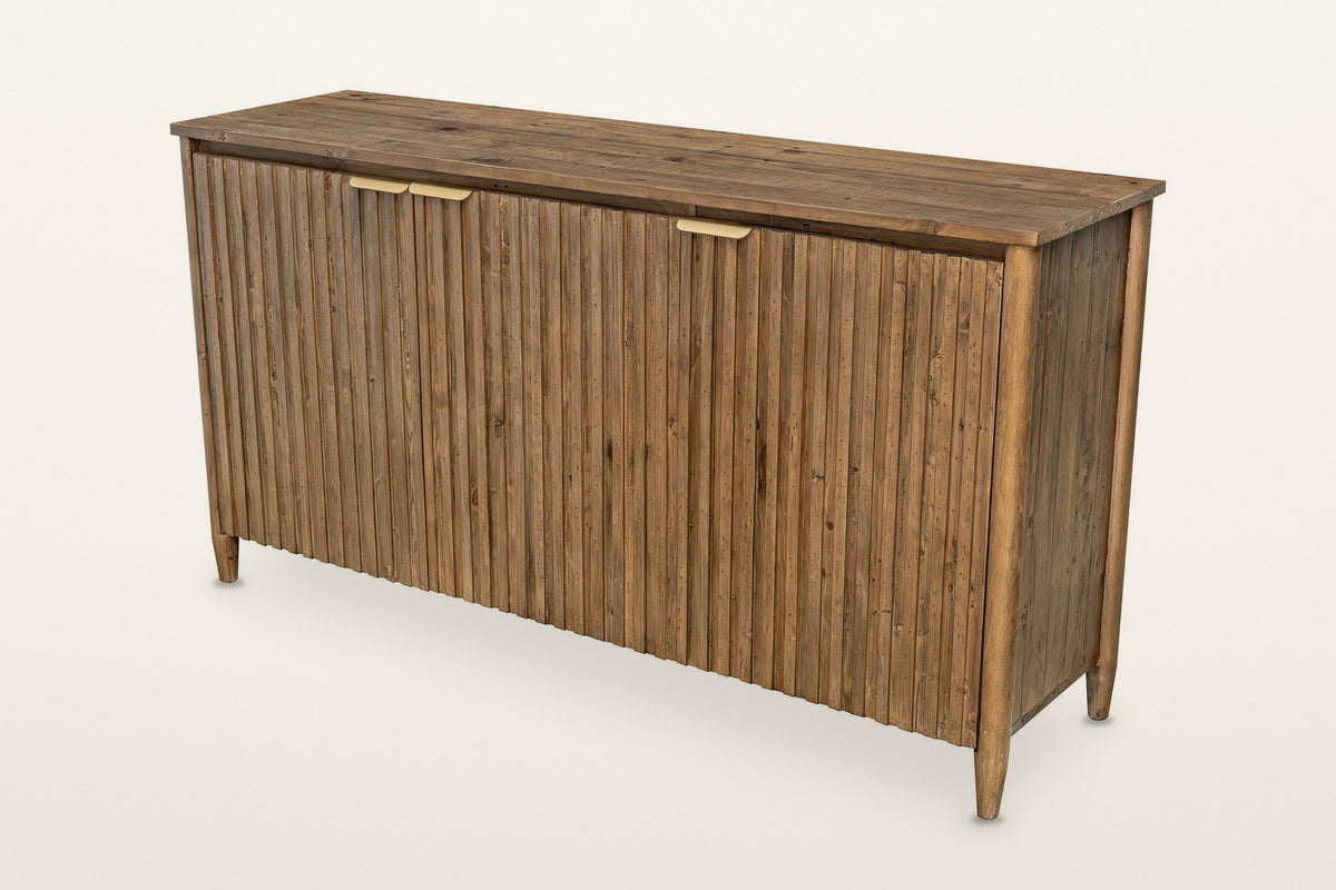 Pettorano reeded reclaimed pine sideboard in Brown, three-quarter view on a warm white studio backdrop: three slatted doors