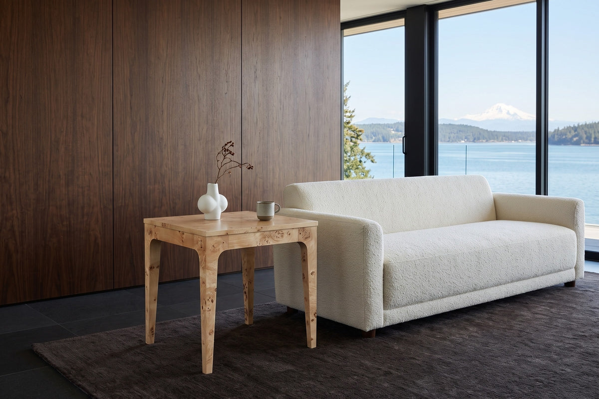 Polcenigo side table in Honey Blonde Burl at the arm of an ivory boucle sofa in a Sidney house