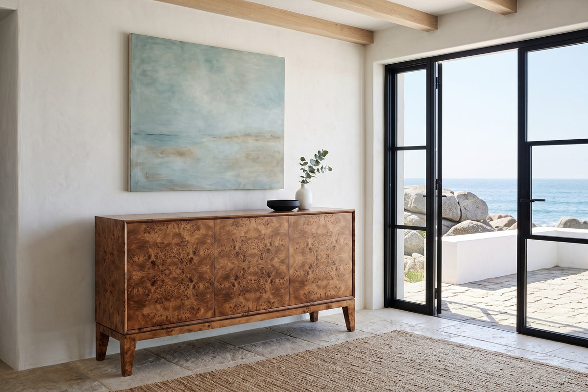 Polcenigo sideboard in Dark Burl against white lime plaster under oak beams in an ocean house in Matosinhos