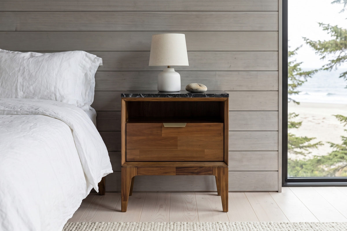 Postignano nightstand seen from the front in a bedroom of a Masset beach house