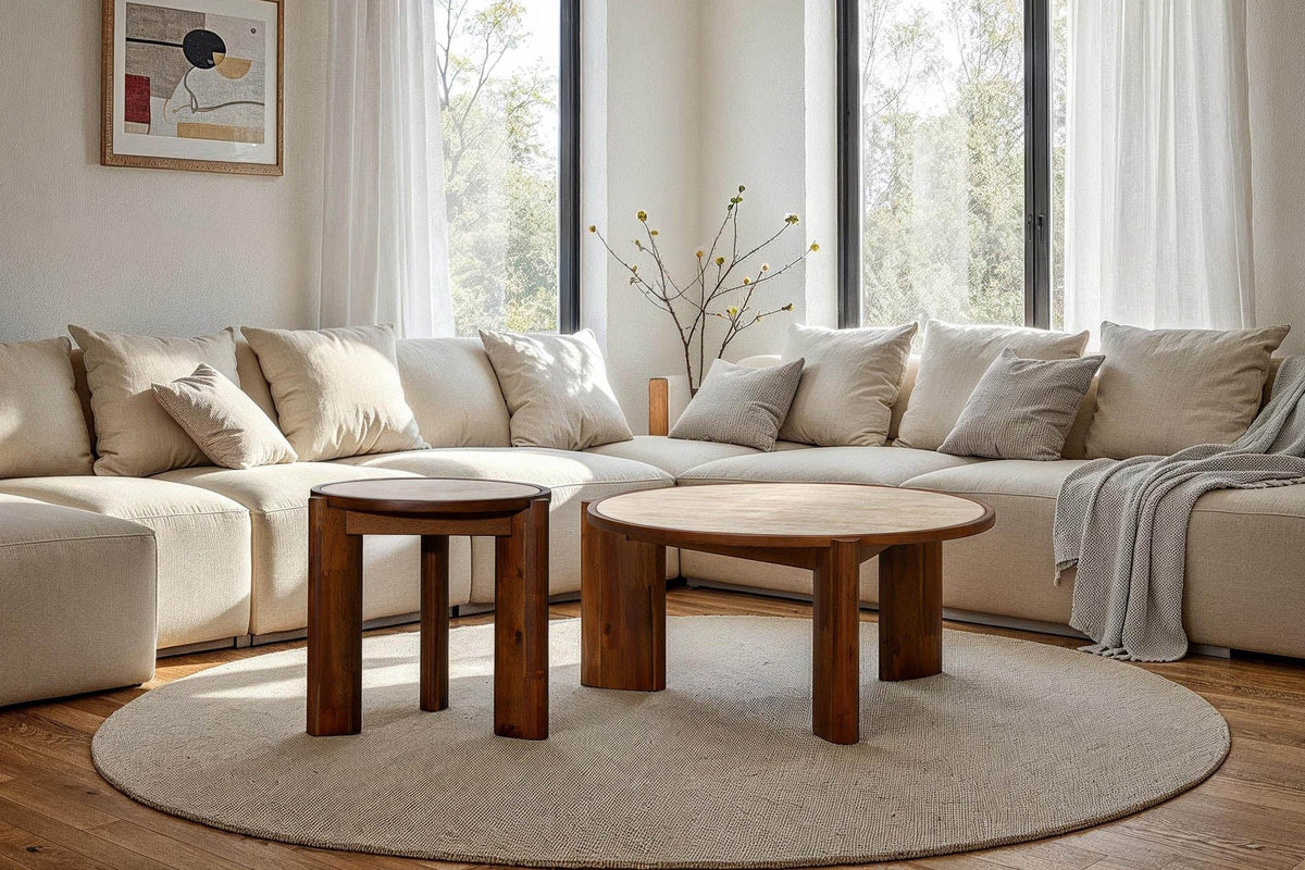 Prescott side table next to the matching coffee table in front of a cream sectional