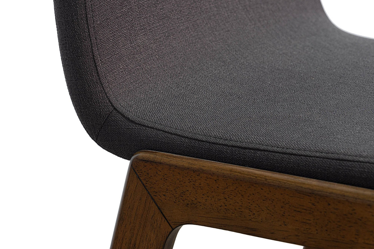 Prescott counter stool close-up of grey woven fabric and curved back