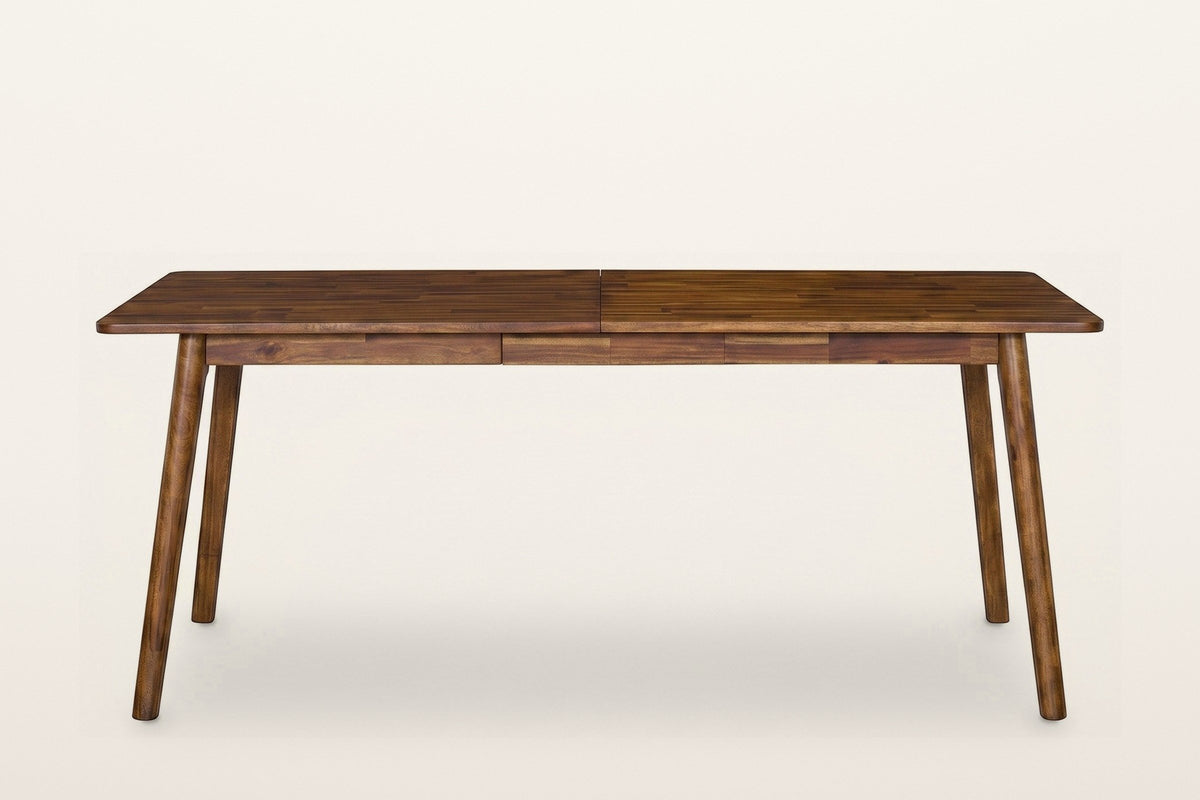 Prescott extension dining table in Brown seen straight on along the long side: the plain apron and four round tapered legs, no stretchers