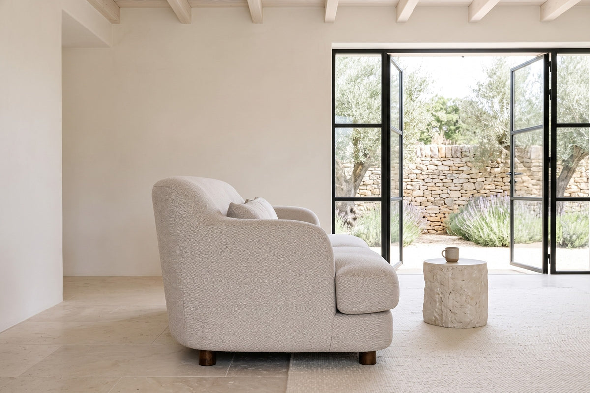 Ripatransone sofa in Beige in side profile in a Melides courtyard house