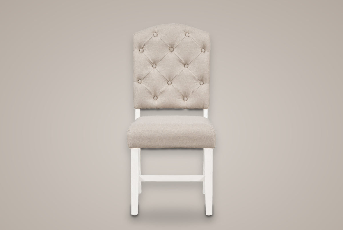 One Saluzzo dining chair, straight front view: arched button-tufted back, padded seat, white legs with a low stretcher