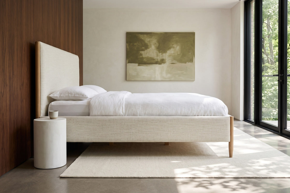 Low side view of the Sarnano bed in a bedroom in a Rosedale ravine house in Toronto