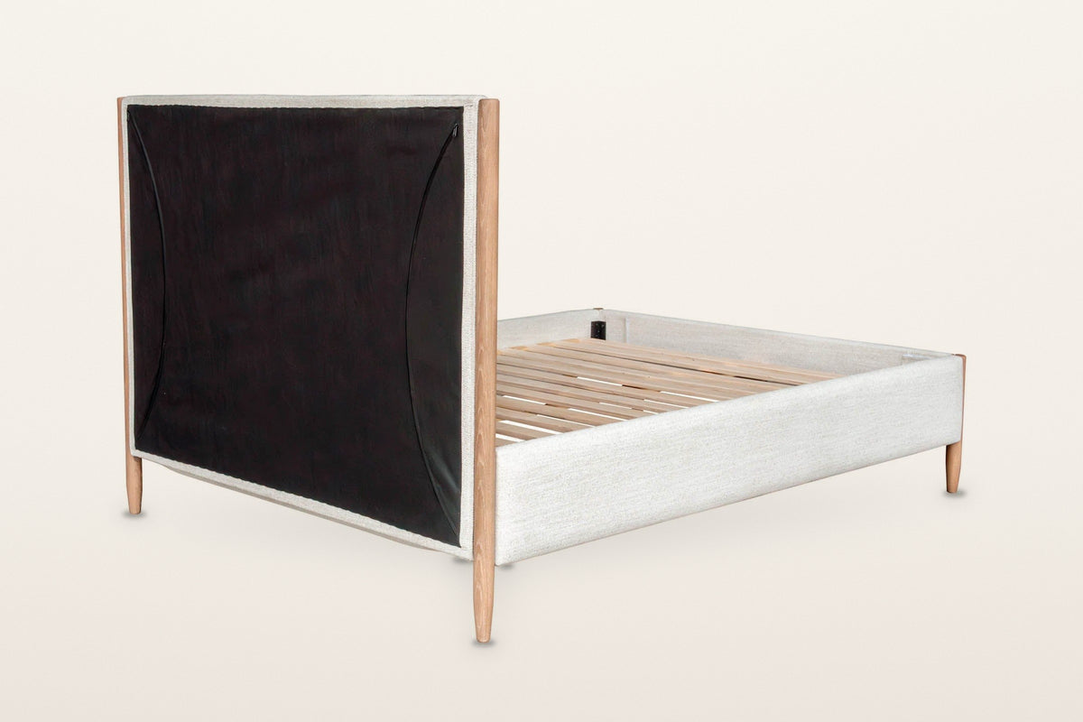Sarnano bed from behind the headboard on a warm white studio backdrop