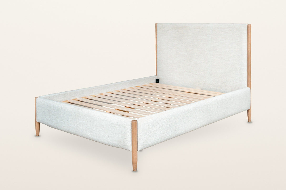 Sarnano bed frame in Alabaster fabric with Sand oak posts