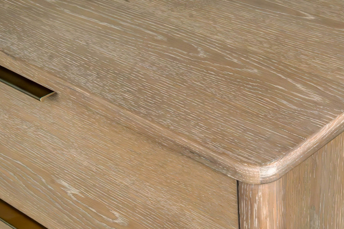 Close-up of the Sarnano top in Sand oak: the softly rounded front corner