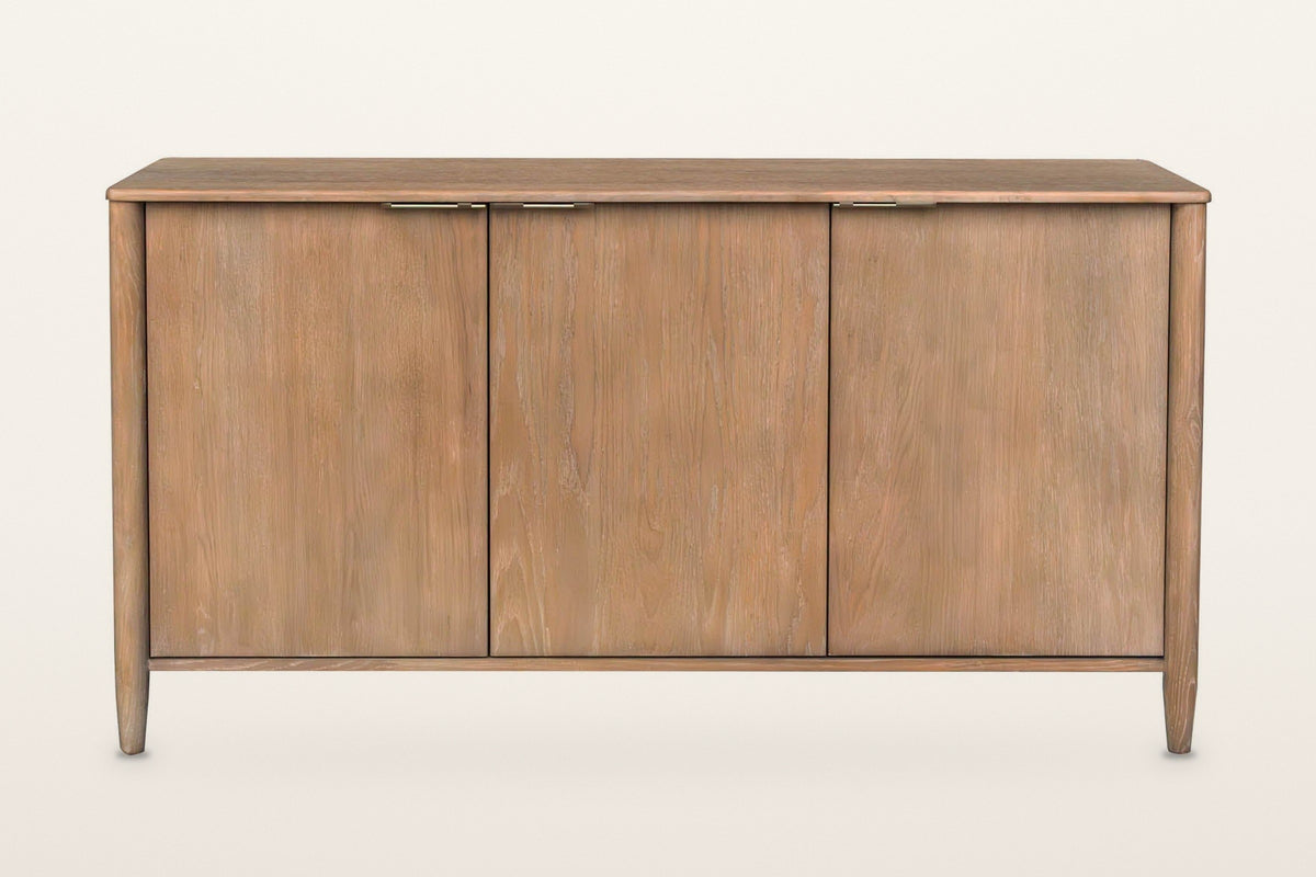 Sarnano sideboard in Sand, straight front view on a warm white studio backdrop: three equal flush doors