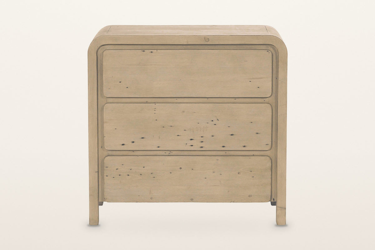 Scheggino chest in Brown, front view on a warm white studio backdrop: the waterfall top and sides